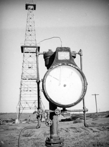 Gauge by an oil rig