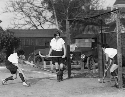 Girls practice for field hockey