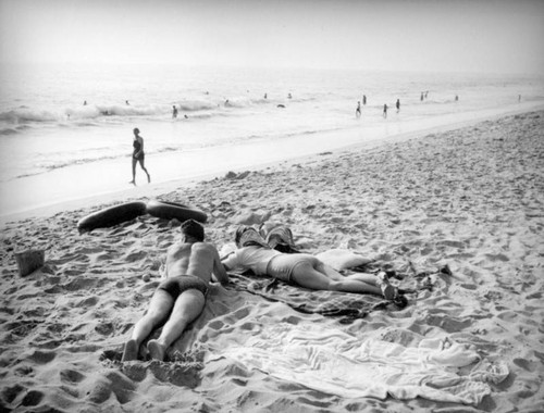 Couple relaxing at beach