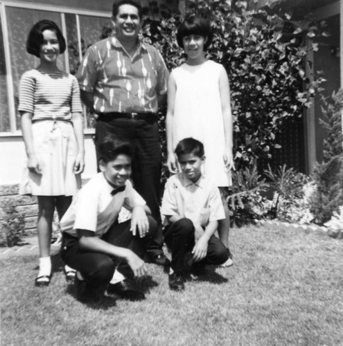 Family in front yard