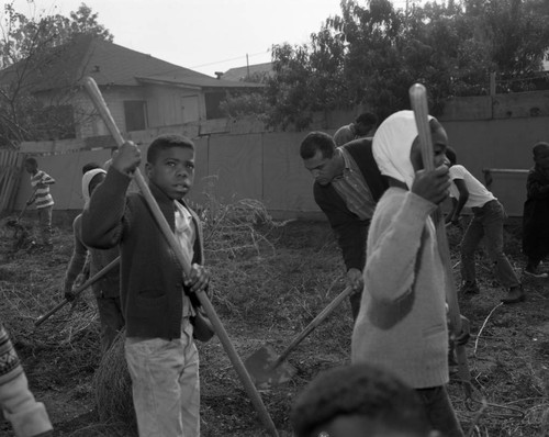 Councilman Billy Mills works with Civilian Conservation Corps