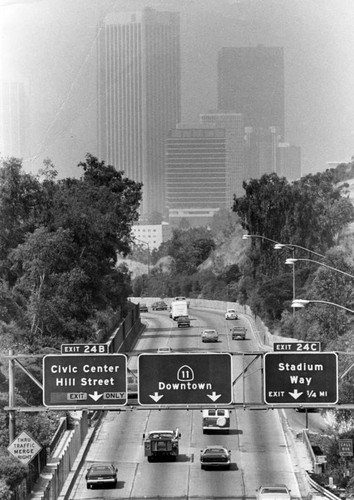 Smog-shrouded downtown buildings