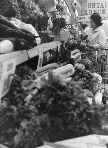 Woman choosing veggies