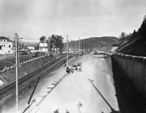 Paving freeway lanes at Cahuenga Pass