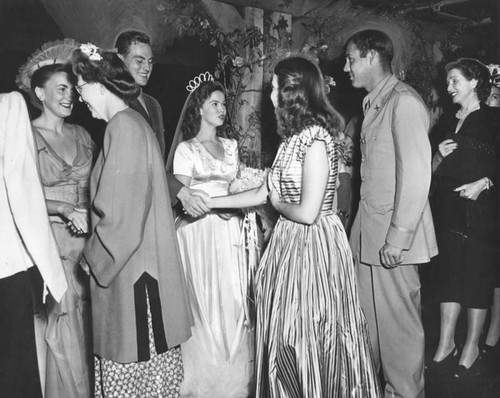 Newlyweds, Shirley Temple and Sgt. John Agar greet the guests