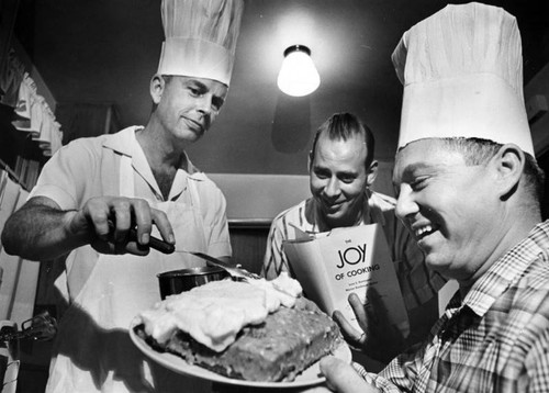 Beachy Avenue dads prepare to serve homemade cake