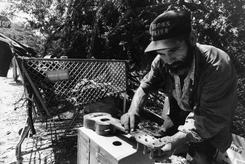 Traveling guitar repairman, Boyle Heights