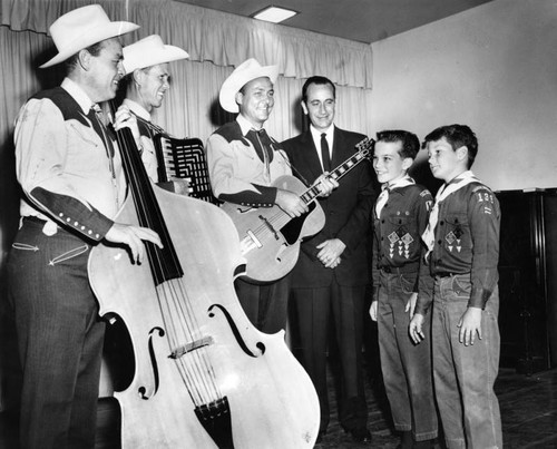 Western trio entertains Cub Scouts