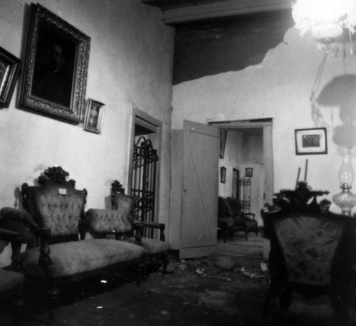 Avila Adobe living room in disarray