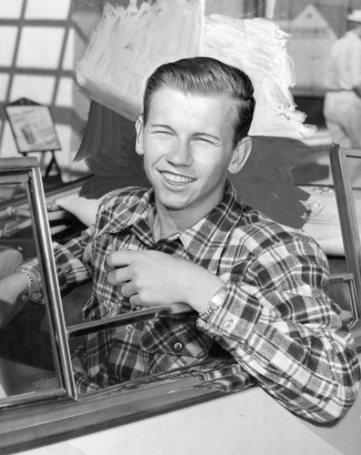 Bill Lear Jr. grooms his P-38