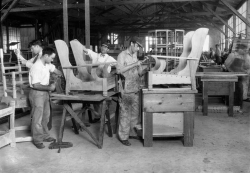 Men building furniture