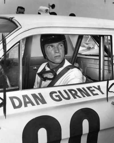 Gurney behind the wheel