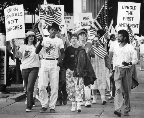 Scientologist supporters march