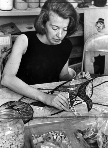 Artist Georgia Haley works on mosaics