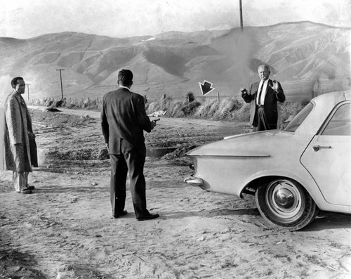 Smith directs officers at murder scene