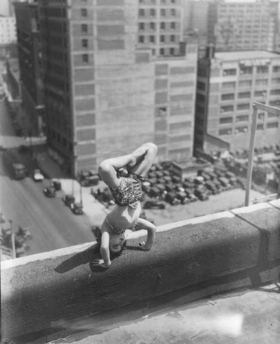 Rooftop child acrobat