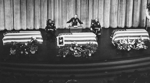 Solemn tribute to officers who died in collision