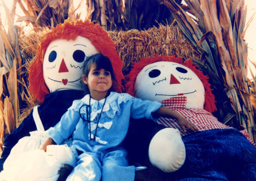 Rebecca with Raggedy Ann and Andy