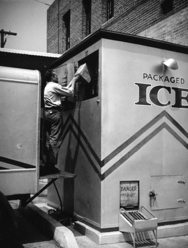 Filling an ice vending machine