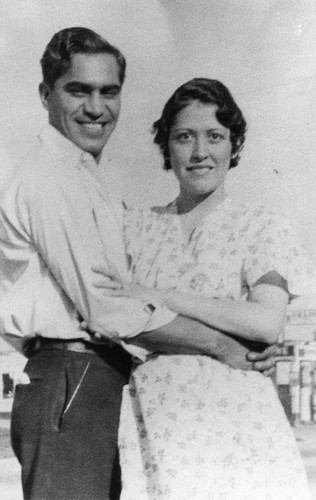 Mexican American family in front yard