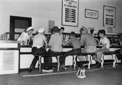 Customers at a Currie's Ice Cream parlor