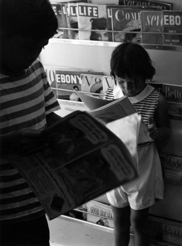 Young readers inside the LAPL Bookmobile