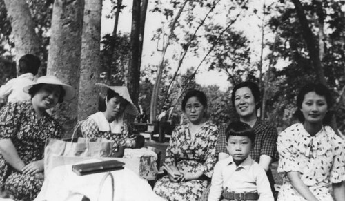 Japanese American women and child in park