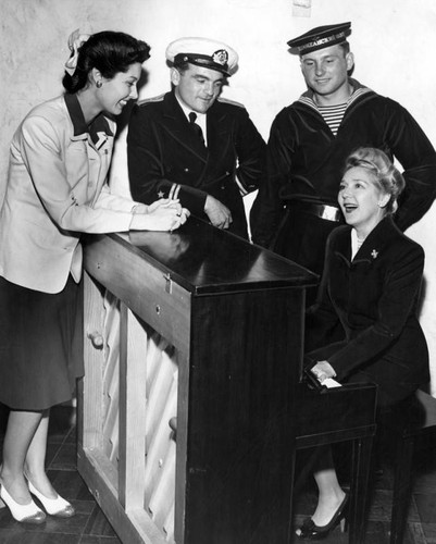 Mary Pickford at piano