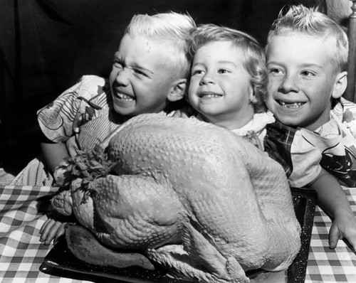 Fowler children with their turkey