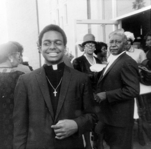 Young reverend at church