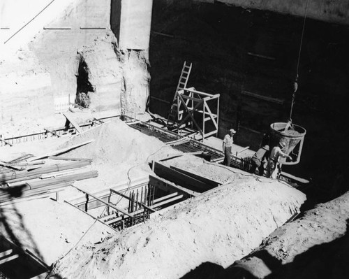 Cement lowered to workers, Cal Tech