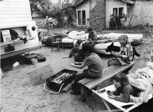 Family lives outside its home