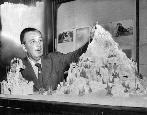 Walt Disney displays model of Matterhorn