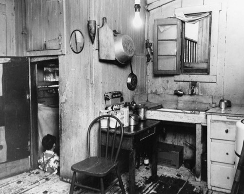 Interior of a two room slum apartment — Calisphere