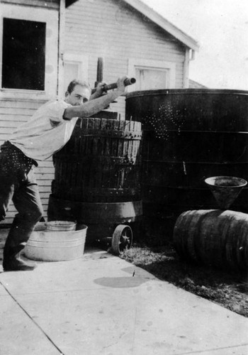 Frank Charolla making wine