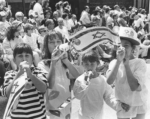 Youngsters blow horns at Salute to Israel Parade