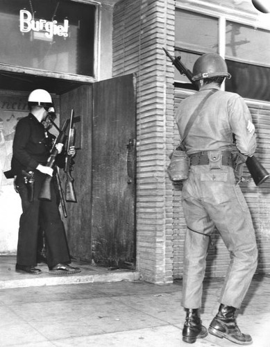 Police check a beer tavern, Watts Riots — Calisphere