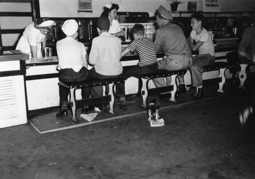 Customers at a Currie's Ice Cream parlor