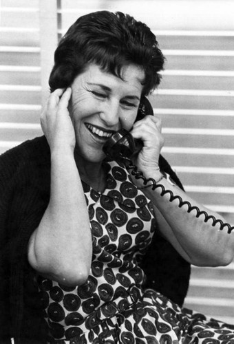 Mrs. Gladys Bazell waits to talk to her son, Frank, by overseas telephone