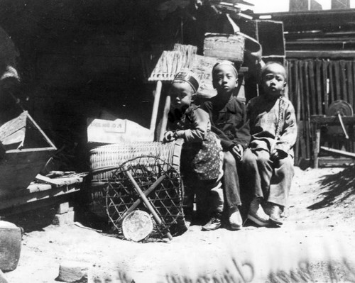 Three children in Chinatown