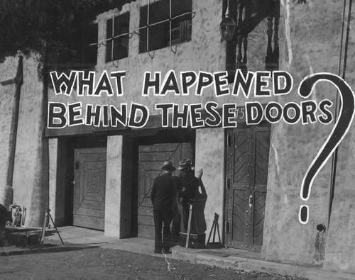 Police stand outside the doorway of the Pacific Palisades garage where the body of Thelma Todd was found Dec. 16, 1935. The garage of Castillo del Mar belonged to the beach home of Roland West, her business partner and manager of her seaside cafe. The newspaper wrote the words.