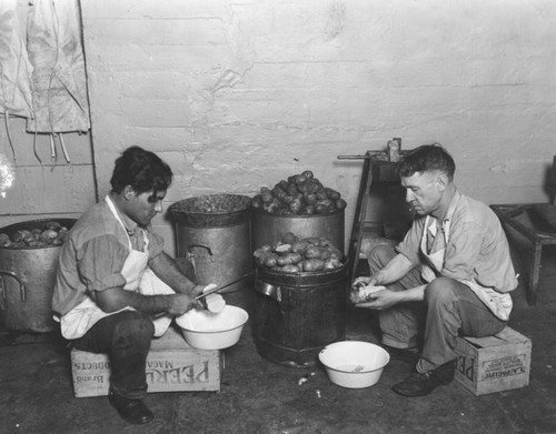 Peeling potatoes in the jail kitchen