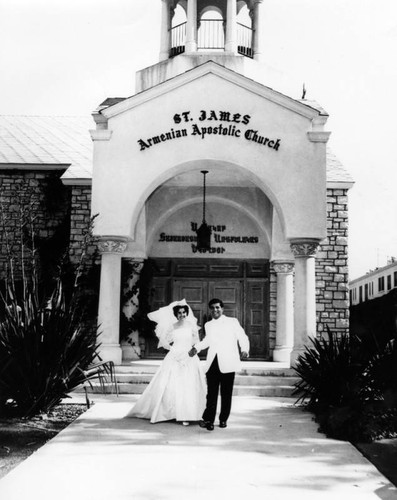 Bride and groom leaving church