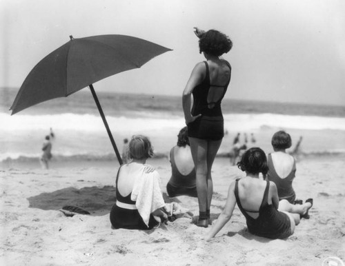 Women facing waves