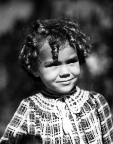 Young girl modeling dress