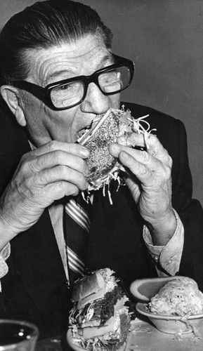 Howard Jarvis eating sandwich