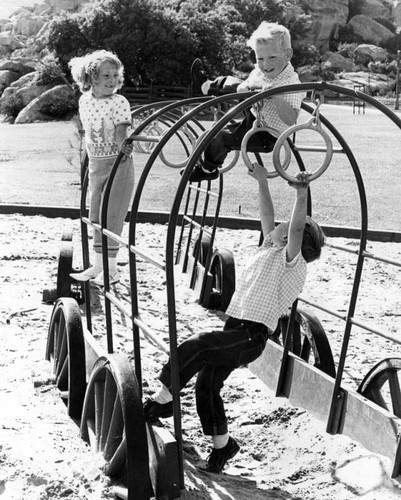 Western style play area features wagon train