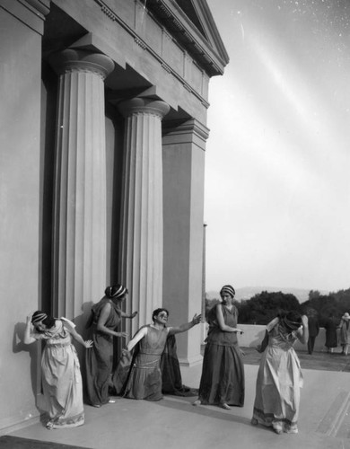 Cast members at the Greek