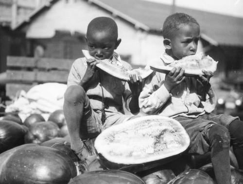 Children eating watermelon