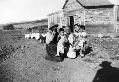 Mexican American family on farm